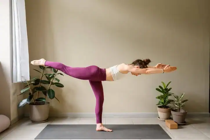 Achieving the Perfect Tone: How Often Should You Exercise for Results? 1 Woman doing Yoga exercise Deal to help with toning the body.