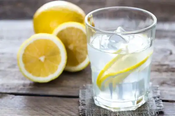 Hydration: The Secret Ingredient for a Toned Stomach and Enhanced Fitness 2 Image of lemon water to aid hydration Deal
